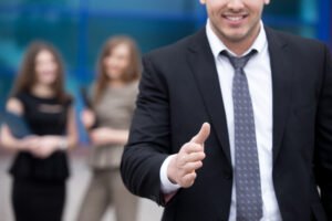 young business man offering hand for handshake